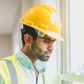 Construction workers in Long Island planning a residential project